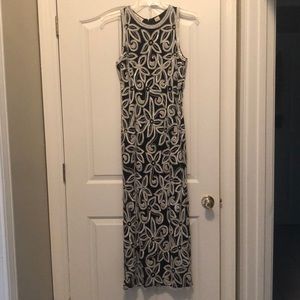 Formal beaded sleeveless Laurence Kazar gown.